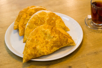 Traditional Turkish fried dough filled with minced meat,close up