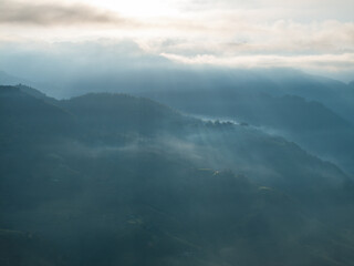 Aerial view of golden rice terraces in Kim Noi commune at Mu Cang Chai town near Sapa city, Vietnam. Beautiful terraced rice field in harvest season in Yen Bai province