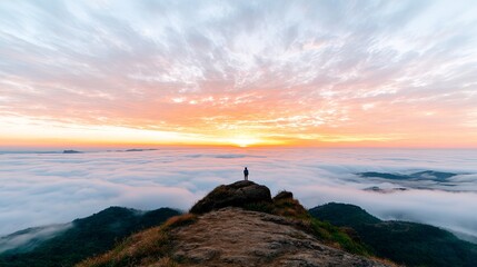 A breathtaking view of a vast landscape at sunrise, with vibrant colors illuminating the sky and clouds, creating a serene atmosphere for reflection.