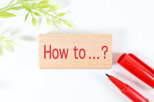 赤文字How toと赤ペン。学習や疑問のイメージ。