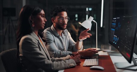 Investment, night and people with computer screen, talking and teamwork with portfolio management. Investors, evening and man with woman, pc and charts for stock market trading and review for profit - Powered by Adobe
