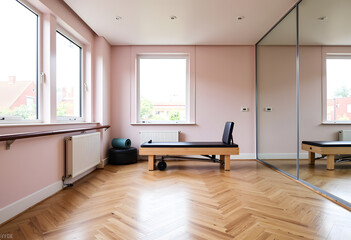 Bright pink pilates studio interior with wooden reformer and mirrors