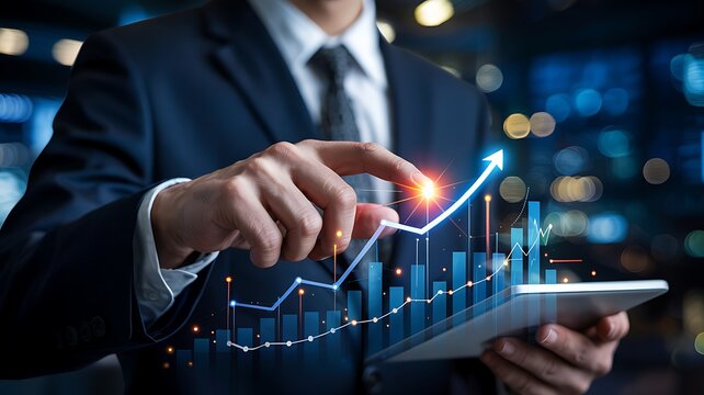 Businessman analyzing financial growth chart on tablet computer with futuristic city lights background