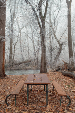 Empty Picnic table in winter park by boise river
