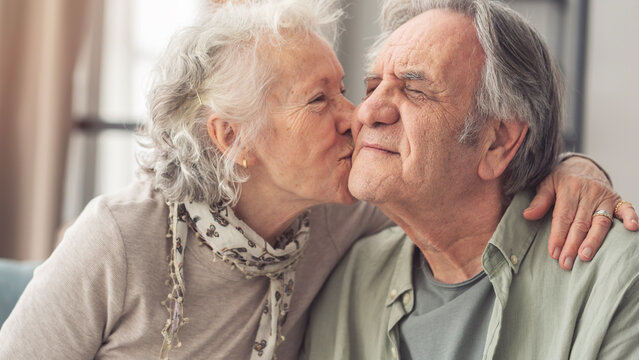 Portrait of a happy senior couple at home - Powered by Adobe