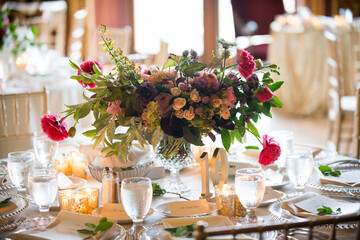 Romantic Reception Table with Lush Centerpiece and Candlelight