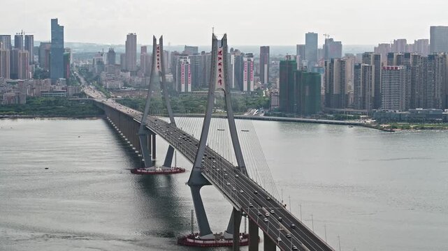 Zhanjiang Bay Bridge with Modern City Skyline and Urban Architecture in Guangdong Province China