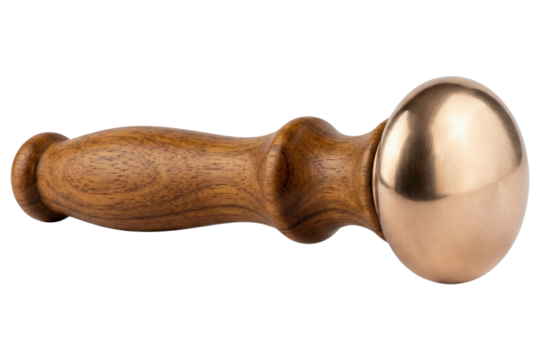 Ayurvedic bronze kansa wand massage tool isolated on white background