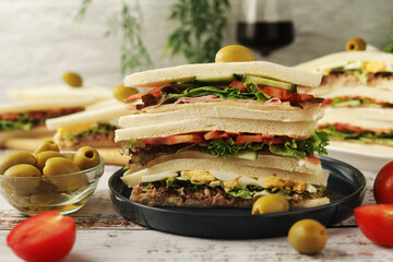 Different Italian tramezzini sandwich in tradition triangle form