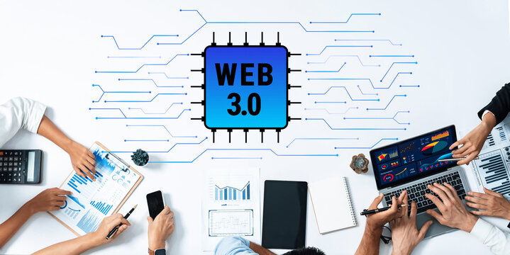 A diverse group of professionals collaborates on data analysis related to Web 3.0 technology, utilizing modern devices in an organized workspace. Trope - Powered by Adobe