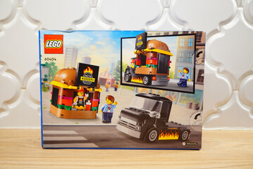 Naklejka premium Lego City Burger Truck Box Set on a Wooden Surface