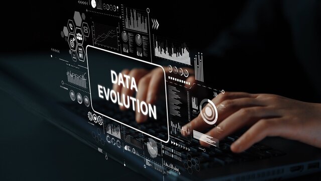 Hands Typing on Laptop with Digital Data Evolution Concept Displayed on Screen in a Dark Environment. Asymptotic smart data analytic.