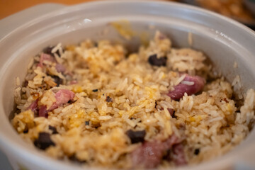 Mixed beef fat fried rice in a bowl, with sliced meat