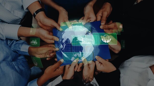 A group of diverse hands gather around a globe, symbolizing unity and cooperation. Digital elements enhance themes of sustainability and collaboration in modern society. Raster