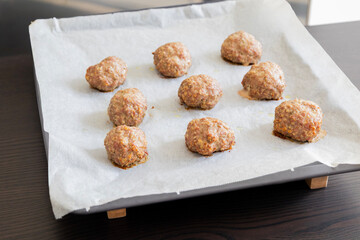 baked turkey meatballs in tray close-up