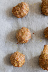 baked turkey meatballs in tray close-up