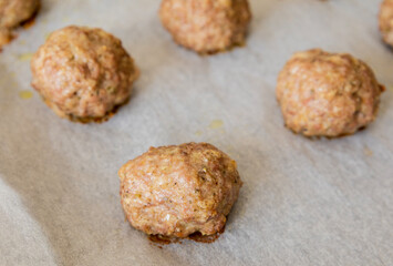 baked turkey meatballs in tray close-up