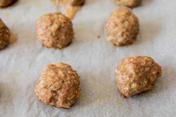 baked turkey meatballs in tray close-up
