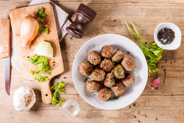grilled meatballs with spices and herbs, top view