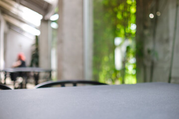 A table and chair in cafe with blurred background