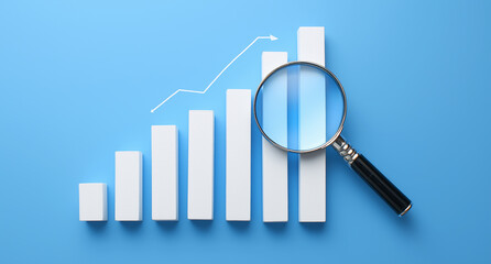 White Bar Graph with Magnifying Glass on Blue Background