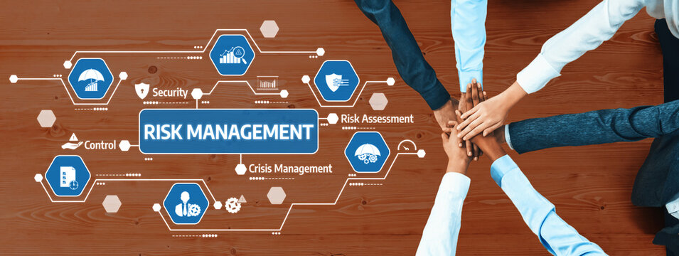 A diverse business team works together on risk management strategies, using technology icons to enhance collaboration and ensure effective crisis management and assessment. Amity - Powered by Adobe