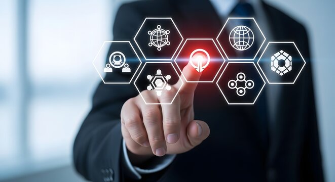 Businessman interacting with digital interface displaying business and technology icons