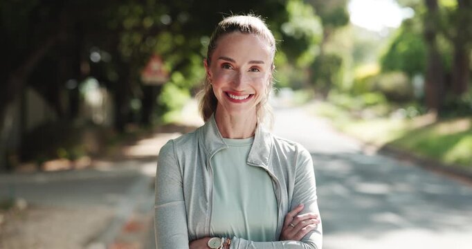 Happy woman, face or fitness with confidence in neighborhood street for health and wellness. Portrait, active or female person with smile or arms crossed for physical activity or balance in town
