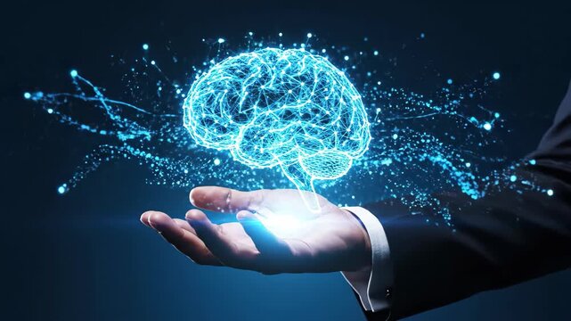 Futuristic digital brain hologram in businessman hand, artificial intelligence video, cyber technology concept, glowing blue neural network data - Powered by Adobe