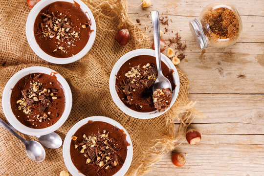 homemade chocolate mousse with nuts - Powered by Adobe