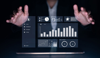 A person reaches out towards a sleek, transparent touchscreen displaying advanced data analytics and performance metrics, symbolizing modern technology in business. Impute