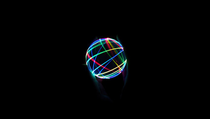 A glowing sphere filled with intertwining glowing lines of various colors is positioned in the center of a dark background.
