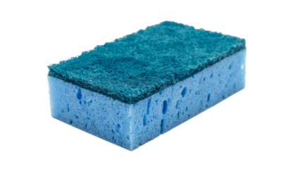 A blue rectangular sponge with a green abrasive pad on top, oriented diagonally, casting a shadow to the right on white