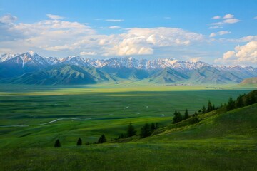 Fototapeta premium Beautiful mountain landscape scenic view green valley and snow peaks sky