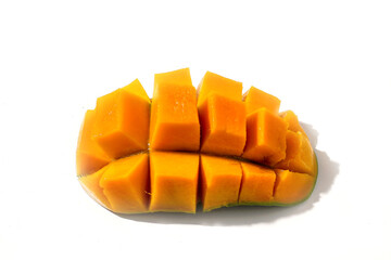 Half a mango on the peel, diced and turned inside out. Isolated on white background.