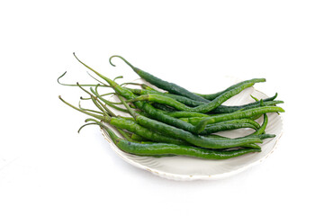 Fresh Green Chilies on a White Plate – Spicy Organic Ingredients, Spicy Green Chilies Collection, Minimalist Food Photography for Asian Cuisine and Cooking Concepts