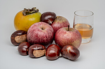 A composition of typically autumnal fruits such as chestnuts, persimmons or the Campanian Annurca apple, enhancing their beauty and detail.