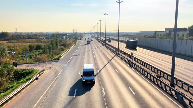 St. Petersburg, Russia &mdash; October 17, 2025: Aerial view of Pulkovskoe Highway with heavy multilane traffic on a sunny day, 4K 60fps. Large urban highway with moving vehicles seen from above, editorial 