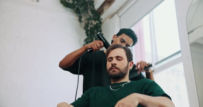 Man, comb and hairdryer at barbershop, customer and tools for low angle, trim or grooming services, People, appliance and equipment for hairdresser, treatment or appointment for makeover at salon
