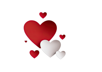 A cluster of red and white hearts of varying sizes arranged on a dark background