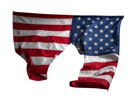 Torn American flag on the grey dusty ground
