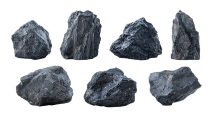 Dark, rough, textured, angular stones isolated on a black background, a collection of geological specimens