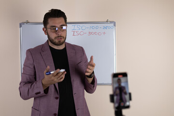 A person is recording a video for a blog