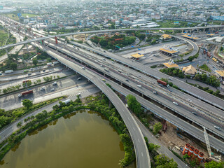 Naklejka premium Aerial view construction site building of junction city downtown transport road with crane