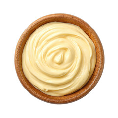 Top-down view of a wooden bowl filled with creamy, light yellow sauce, elegantly swirled