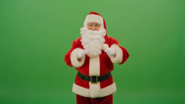 Happy Santa Claus Dancing with Joy on a Green Screen Background