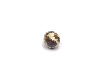 Nice small quail egg isolated on white background