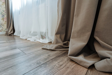 tranquil setting featuring soft linen curtains, calm morning scene with flowing fabrics and warm light, peaceful interior design emphasizing neutral tones and tactile textiles in sunlight