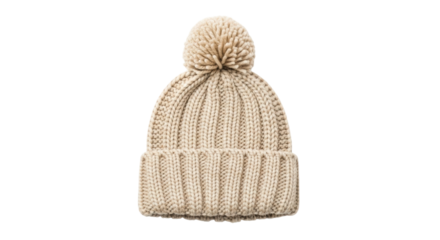 A cozy beige knitted winter beanie hat with a large fluffy pom-pom and a folded cuff, showcasing a chunky ribbed texture and warm, handmade style