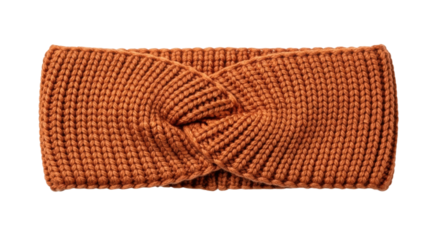 A warm and fashionable rust-colored knitted headband with a central twist, crafted from chunky yarn with a detailed ribbed texture for a cozy autumn or winter accessory